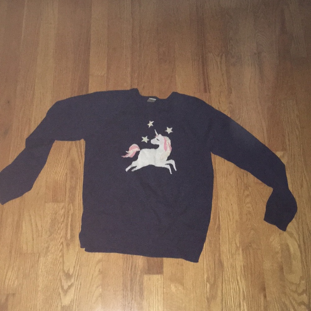 Navy sweater with unicorn on it